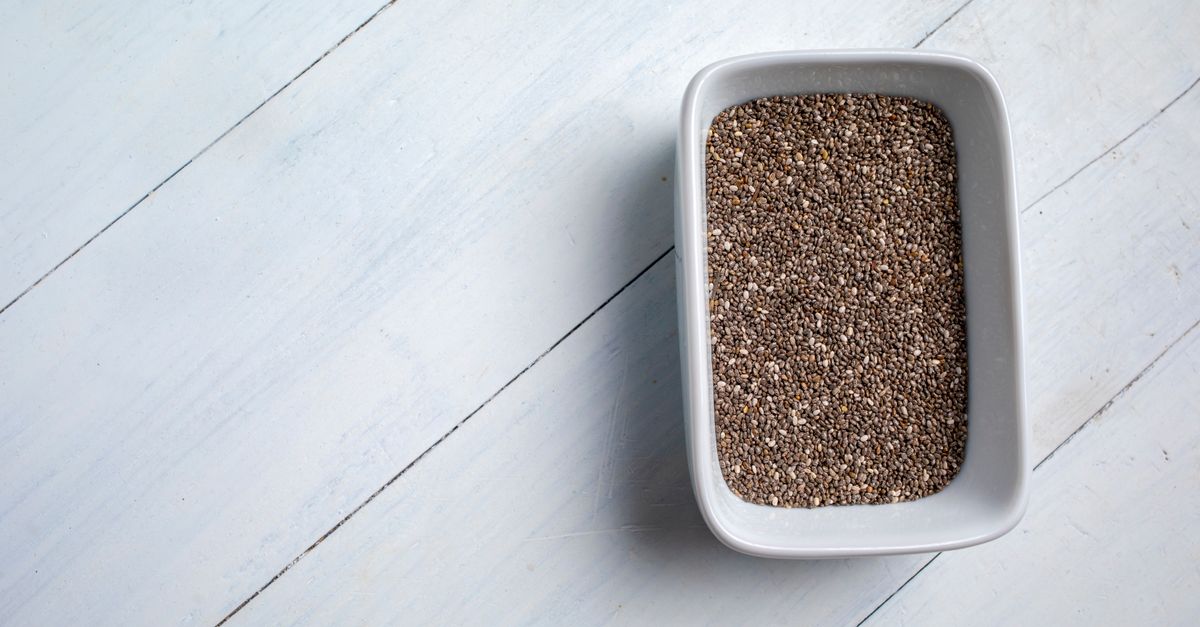 A white bowl of chia seeds for hair growth, which work when eaten rather than applied