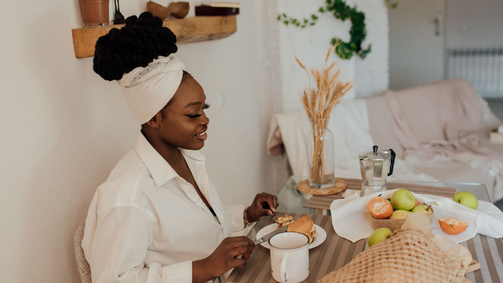 Woman eating a small healthy breakfast at home, eating for your hair on a small appetite
