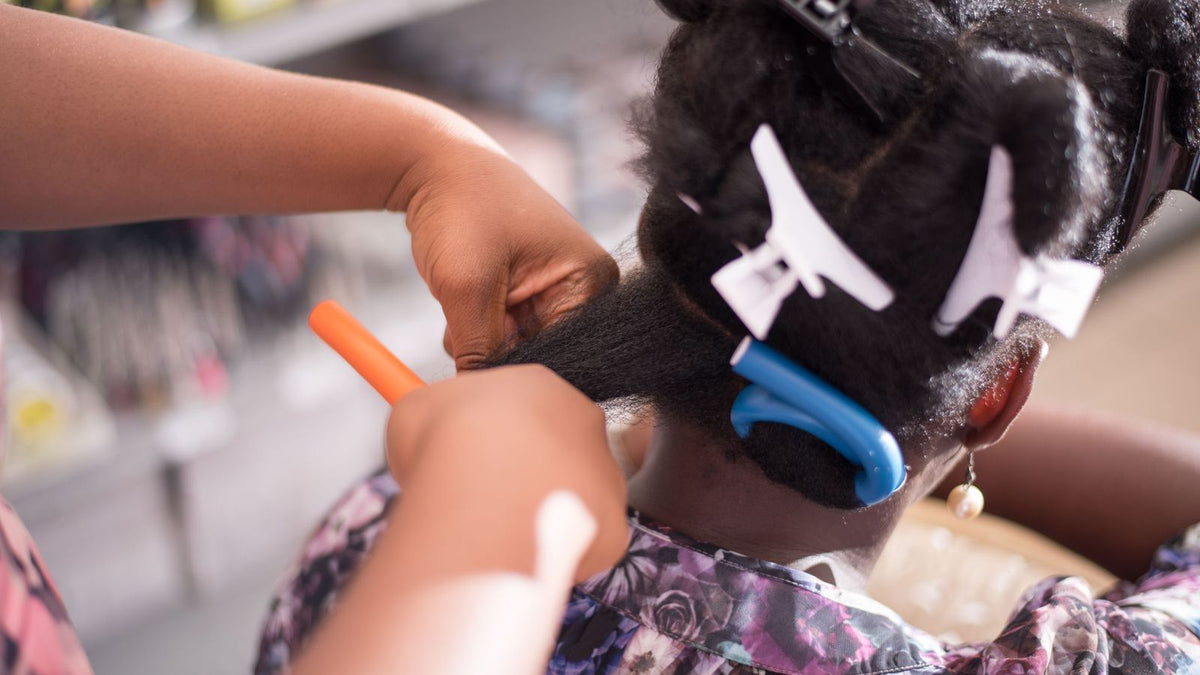 hair density measurement: hair sectioned with clips at a salon ready to be assessed