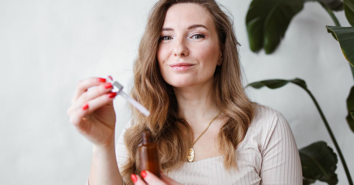 Hair growth serum in a dropper bottle ready to apply to the scalp