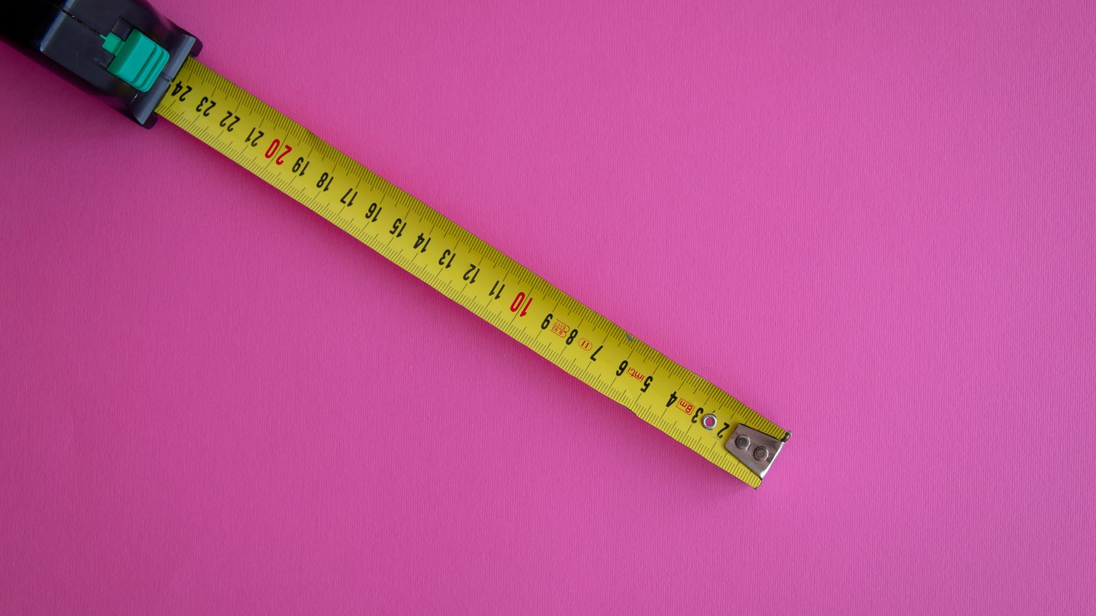 Measuring tape used to track hair growth progress