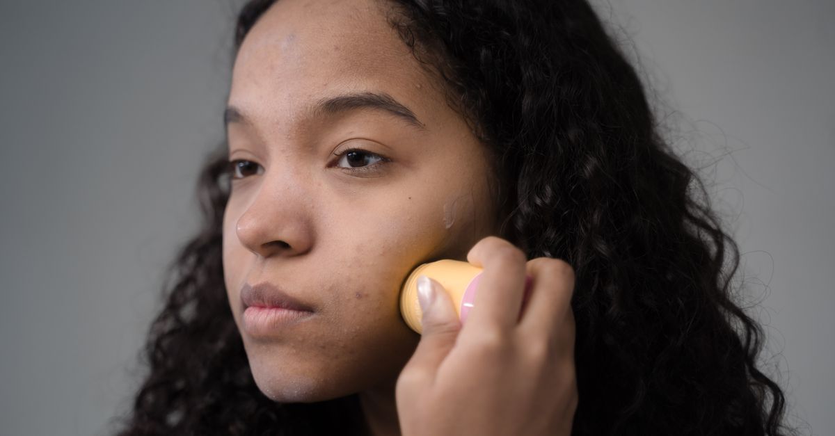 Is 0.25mm derma roller effective? A woman using a skincare roller at home