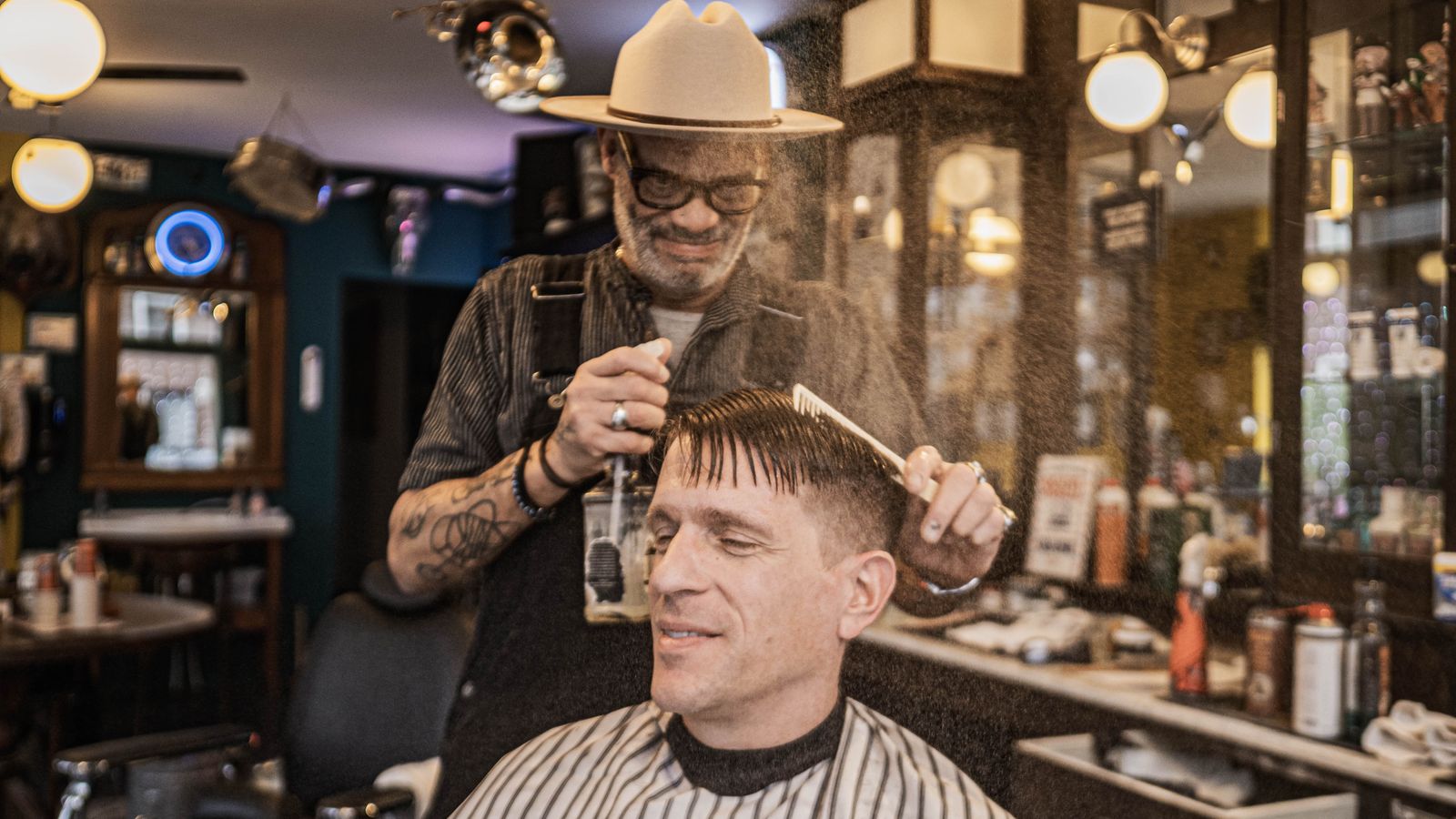 Barber styling a man's hair with pomade, is Murray's pomade bad for your hair