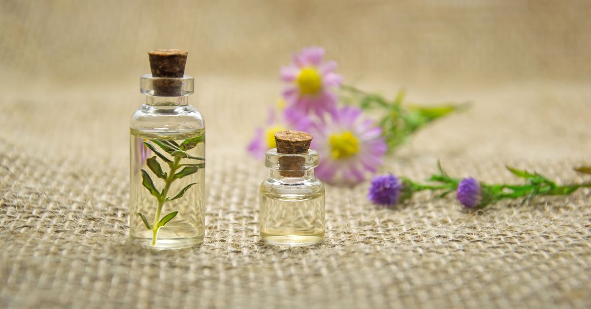 Glass bottles of herbal infused oil for hair