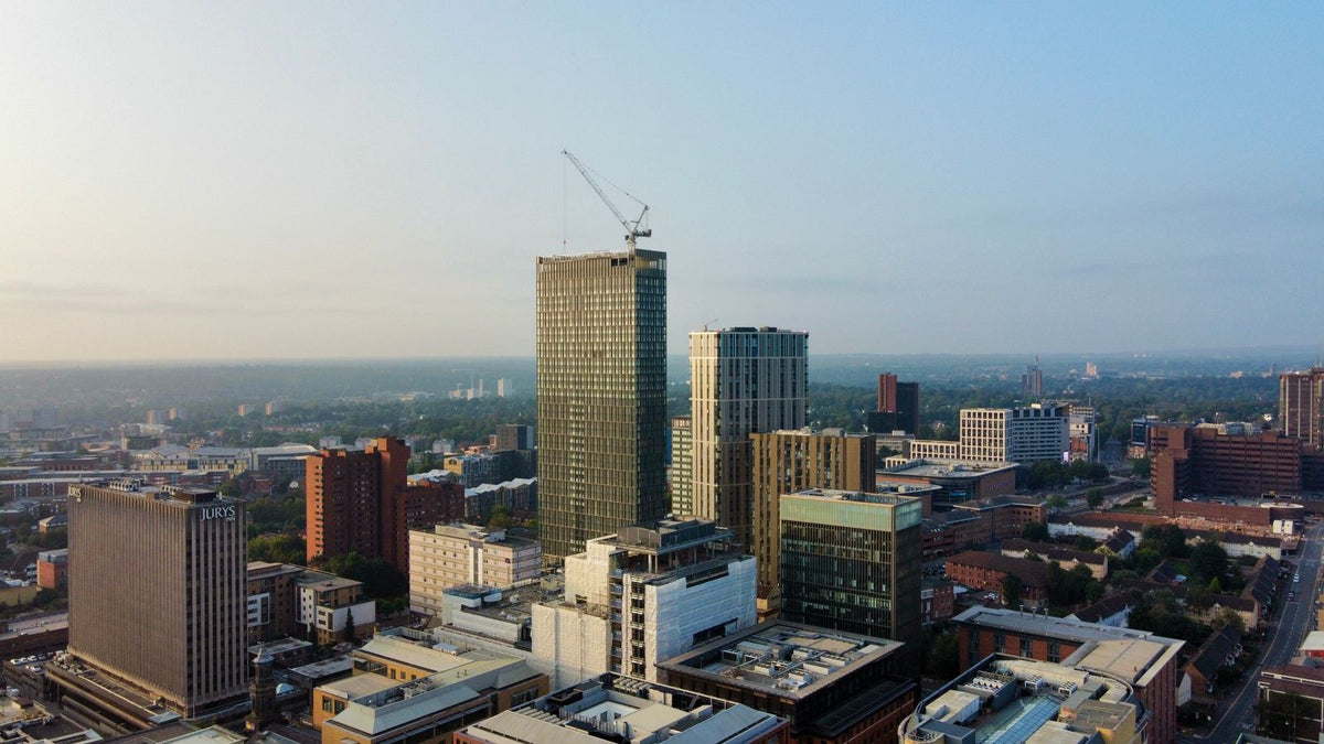 Aerial view of the Birmingham skyline, the starting point for finding a qualified trichologist Birmingham wide