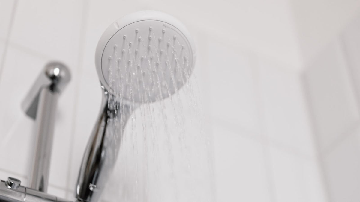 Shower head running, the water question a trichologist Stirling guide starts with