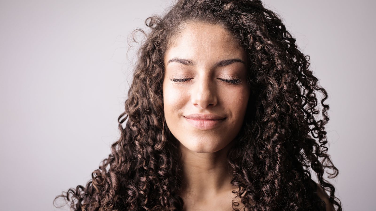 Woman with healthy hair, a guide to finding a trichologist in Newport