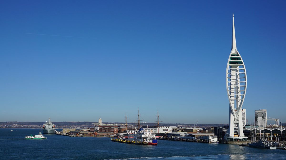 Spinnaker Tower over Portsmouth Harbour on a bright, sunny day by the sea