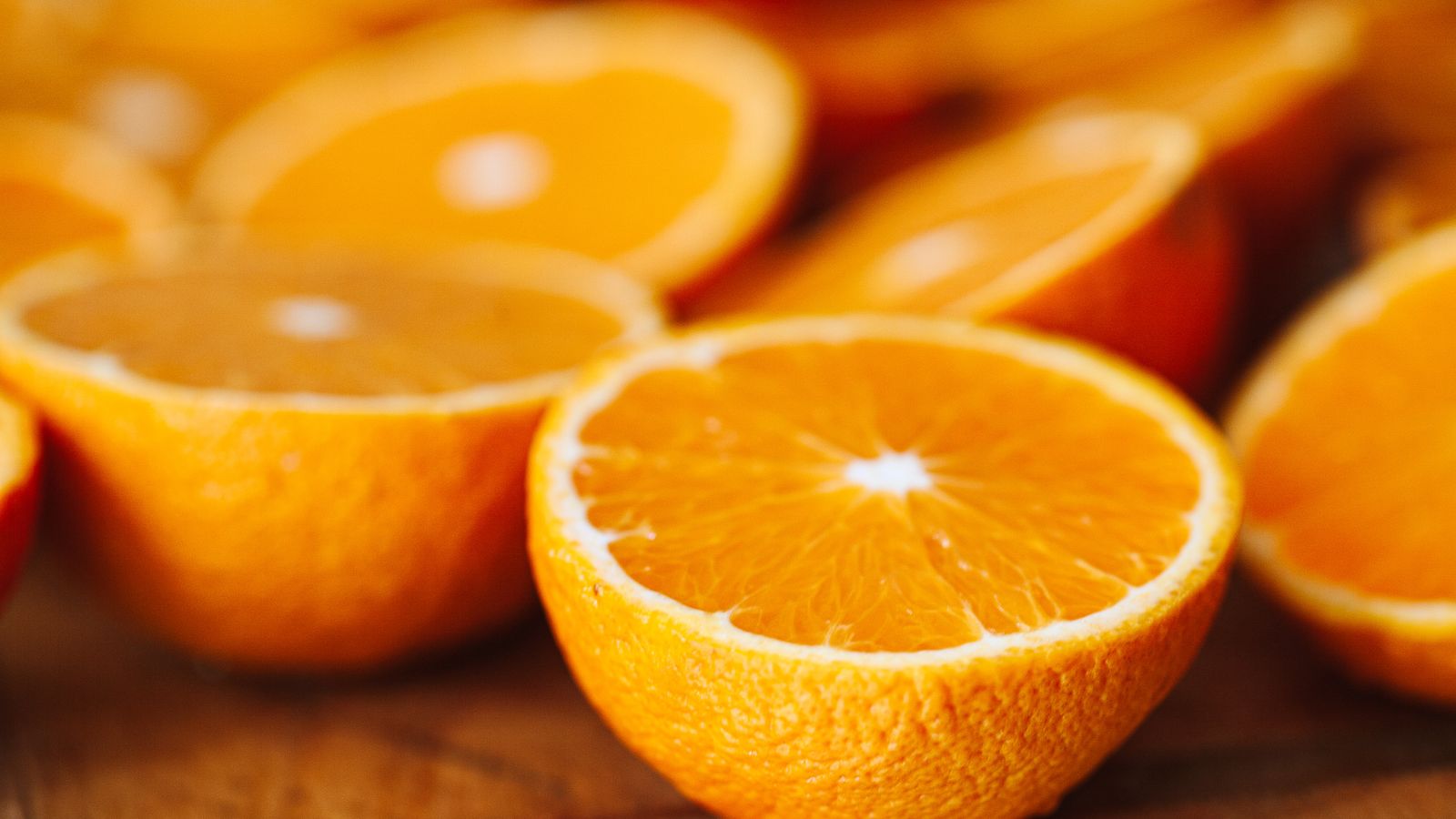 Freshly sliced oranges, the food most people picture when they think of vitamin C for immune system support