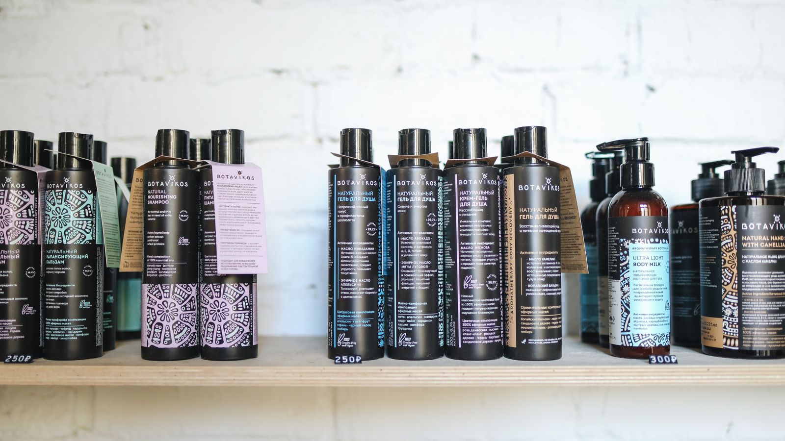 Row of cosmetic bottles on a wooden shelf, the crowded shelf you face choosing the best hair growth shampoo