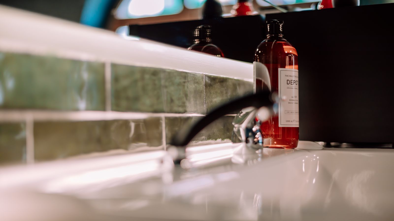 Shampoo bottle on a bathroom sink, illustrating how to choose the best hair growth shampoo