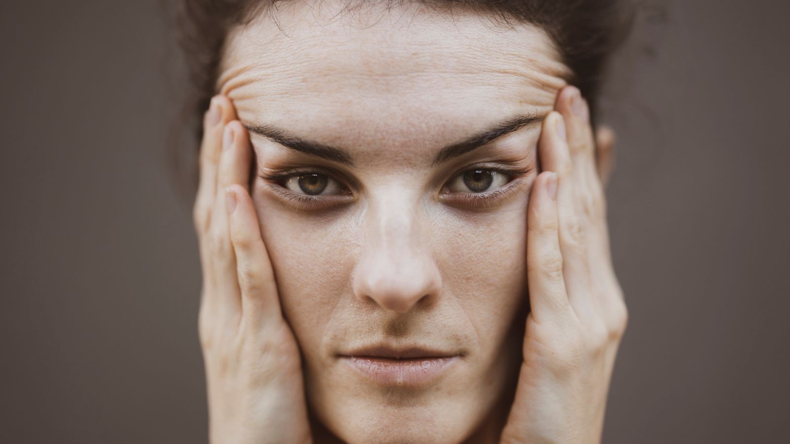 Close up of a defined hairline framing the face