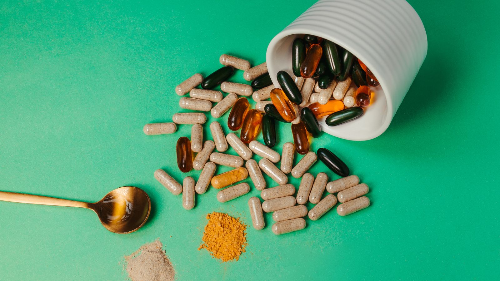 Capsules, tablets and powder laid out, the beauty supplements behind the question do collagen supplements work