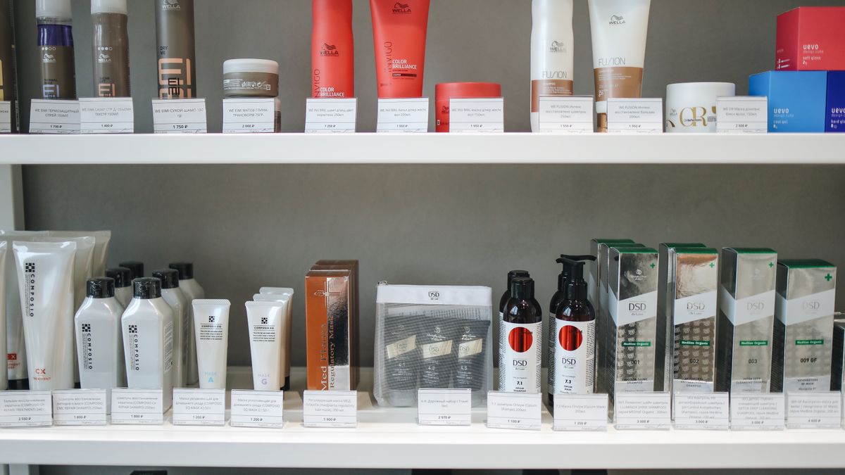 Assorted skincare products lined up on shop shelves, illustrating whether expensive skincare is worth it compared with drugstore options