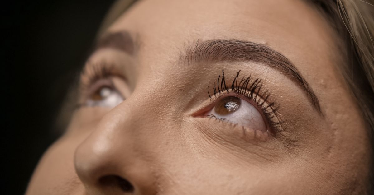 Close up of eyes with long lashes, showing healthy eyelash and eyebrow hair
