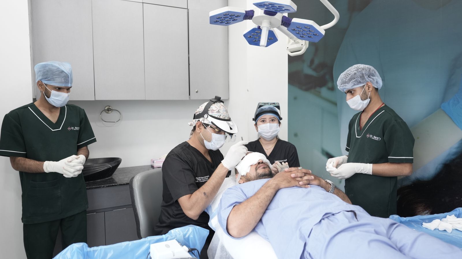 Surgical team at work, weighing an FUE vs FUT hair transplant approach