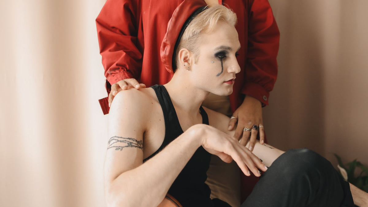 Genderfluid person sitting thoughtfully, the reader gender affirming dermatology is for