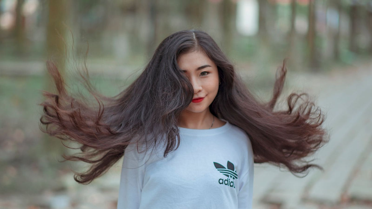 Woman with long flowing hair, illustrating the hair growth cycle diagram stages