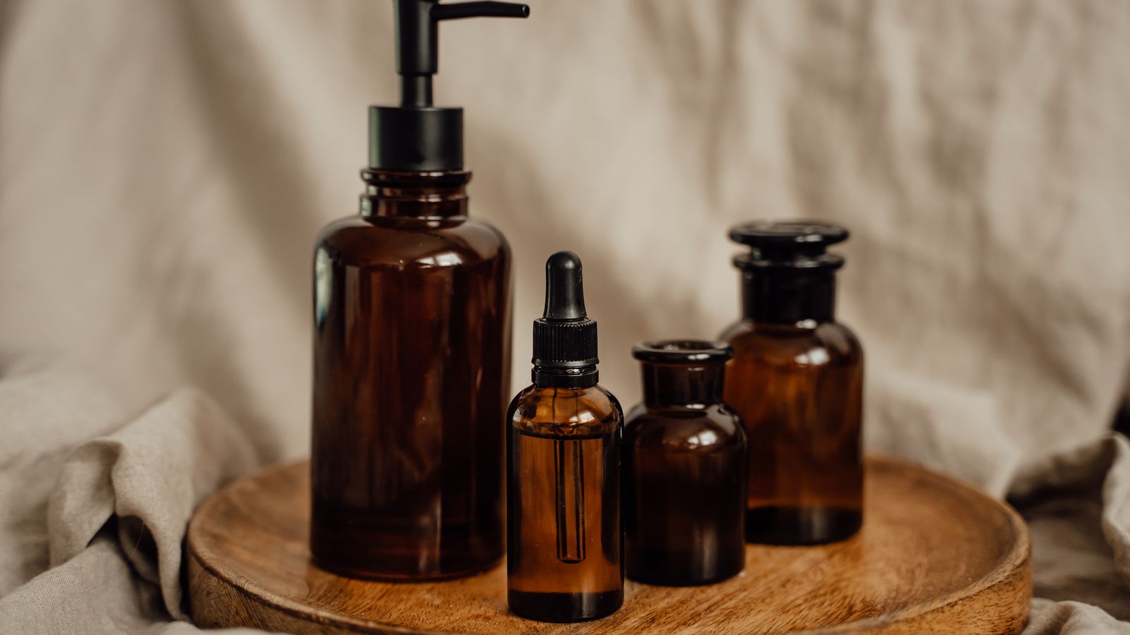 Amber glass bottles of handmade hair growth oil prepared for sale