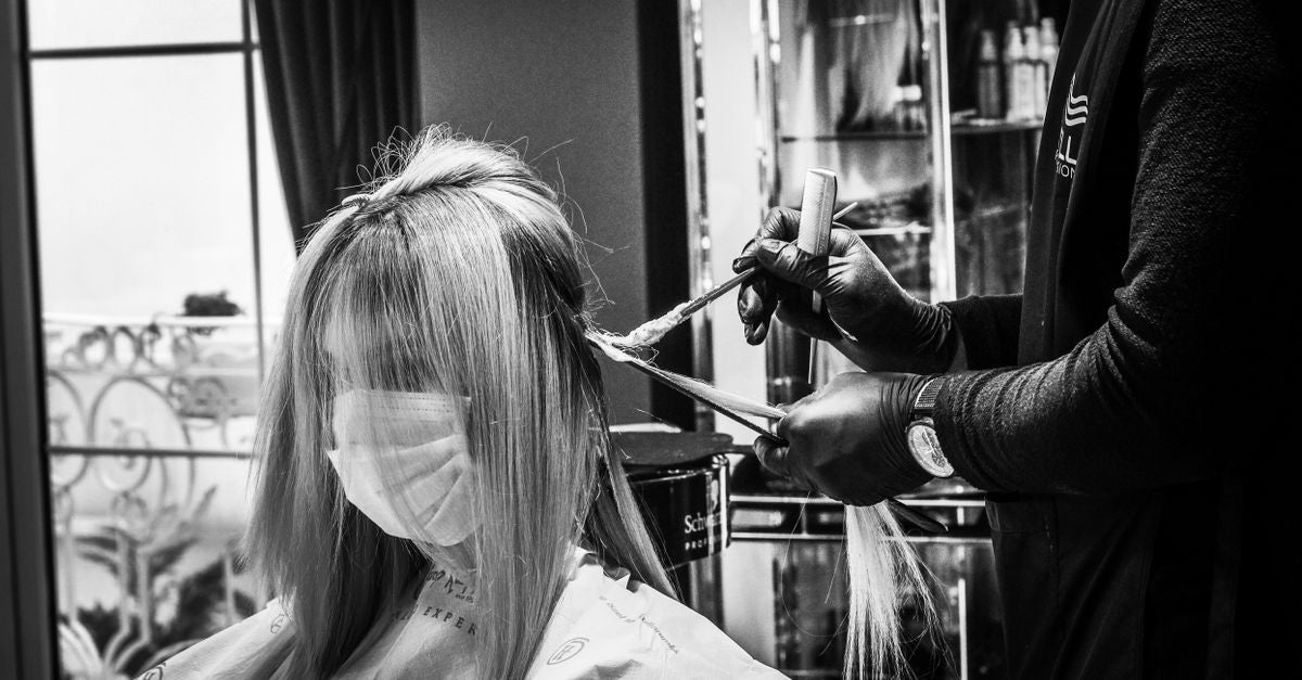 Hair treatment being applied in a salon
