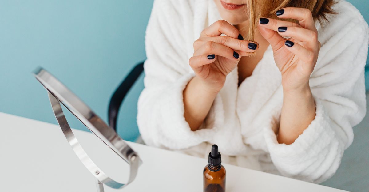 Applying a hydrating hair serum for shine