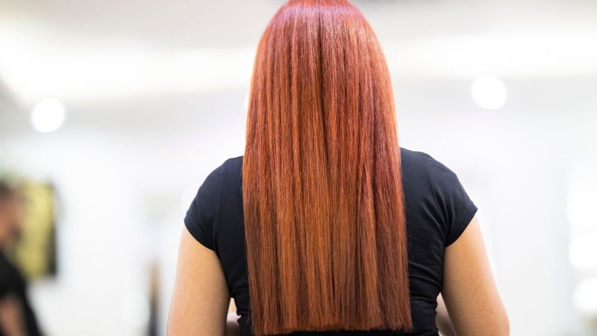 Woman with smooth glossy hair, the result people hope for when asking is lamellar water bad for hair