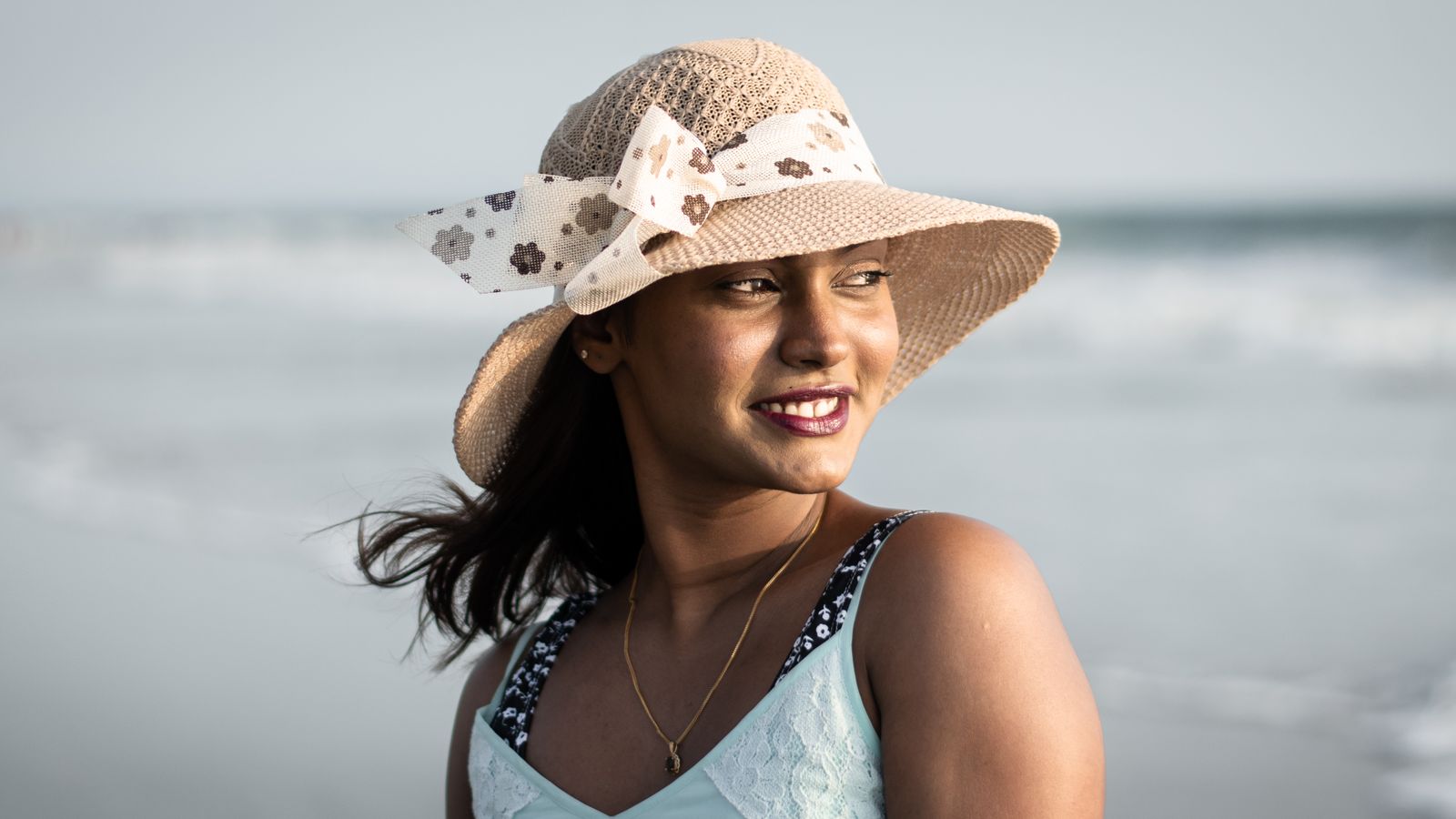 Woman wearing a sun hat, is wearing a hat bad for your hair