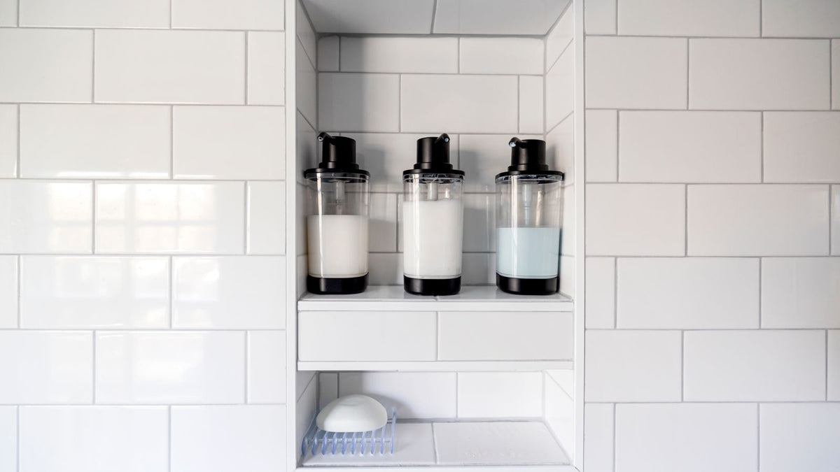 Hair care bottles on a shelf, where you check the key ingredients for hair growth on the label