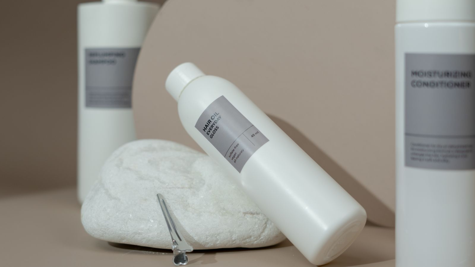 Row of hair care bottles including cosmetic options such as kopexil for hair