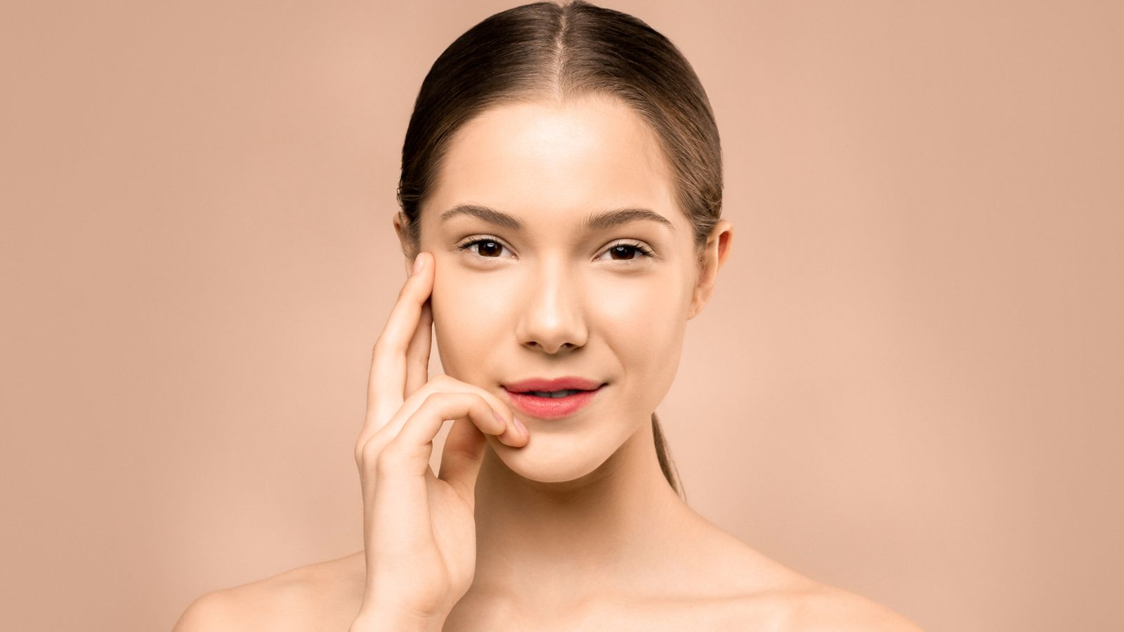 Woman with radiant skin, microneedling vs dermarolling for skin and scalp