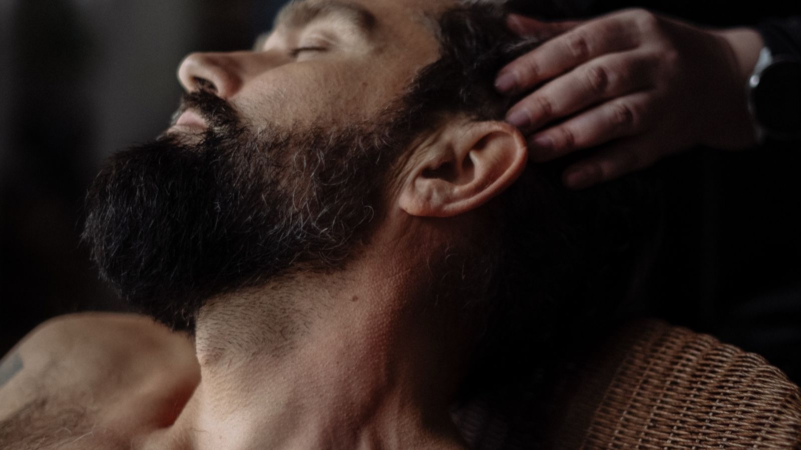 Scalp massage during a hair care routine, often paired with natural DHT remedies for hair