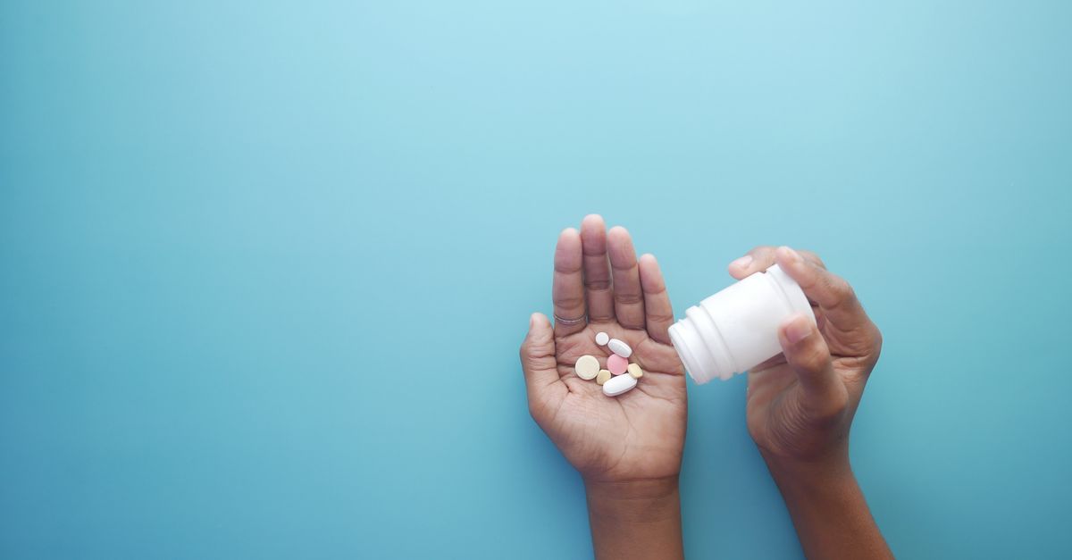 Pouring medication from a bottle, managing steroid side effects