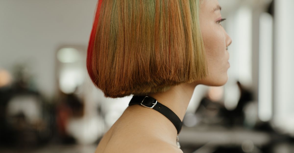Woman with freshly coloured hair, preventing hair fall after colouring