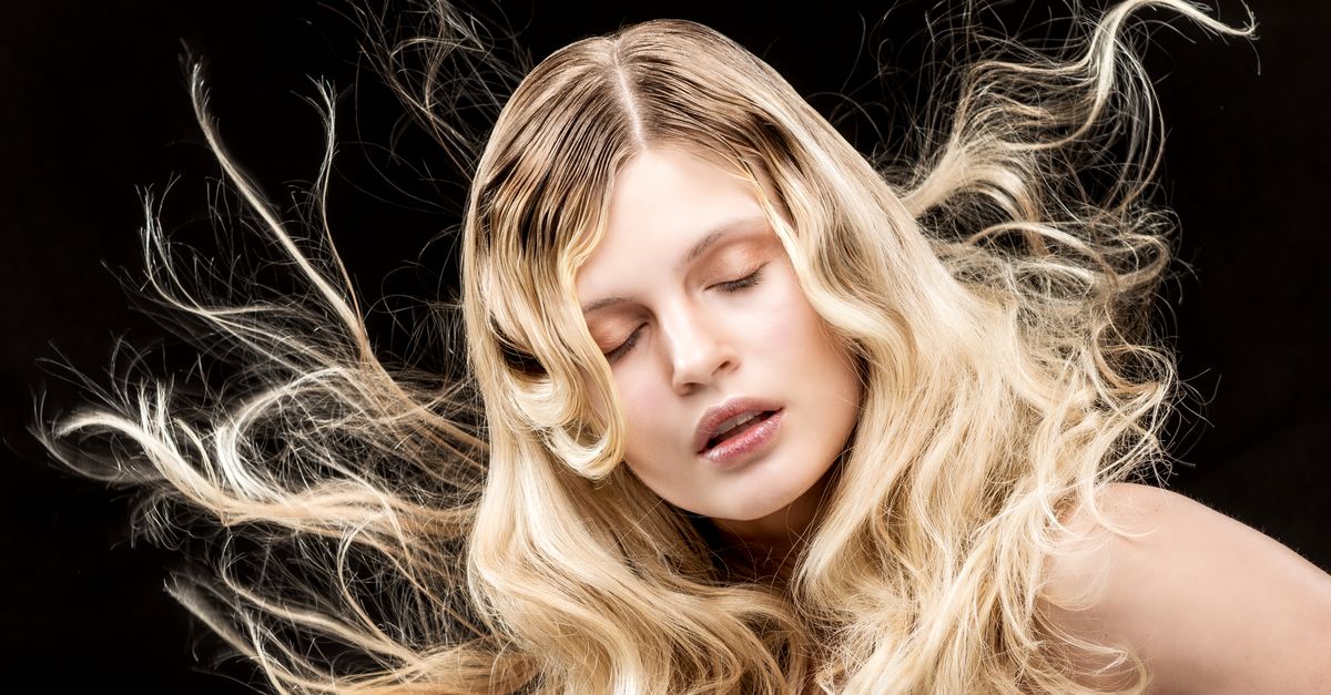 Woman with full, voluminous, thick-looking hair