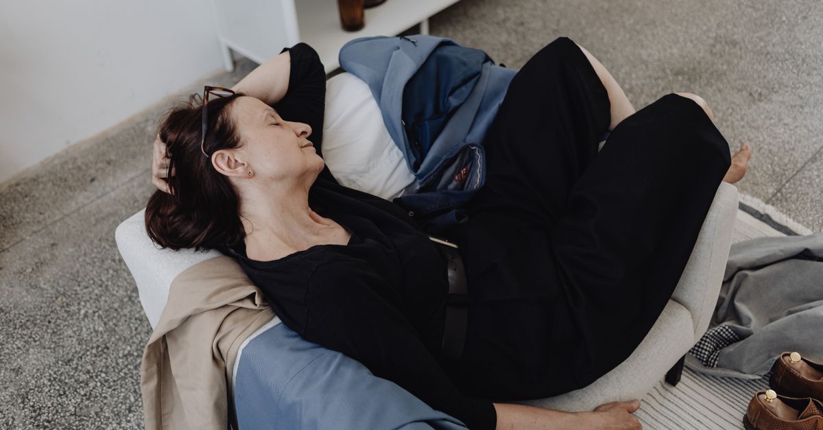 Woman resting and recovering after surgery and anaesthesia