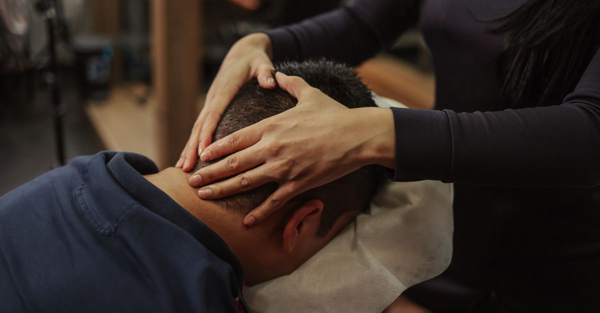 Scalp massage being given with fingertips at the roots