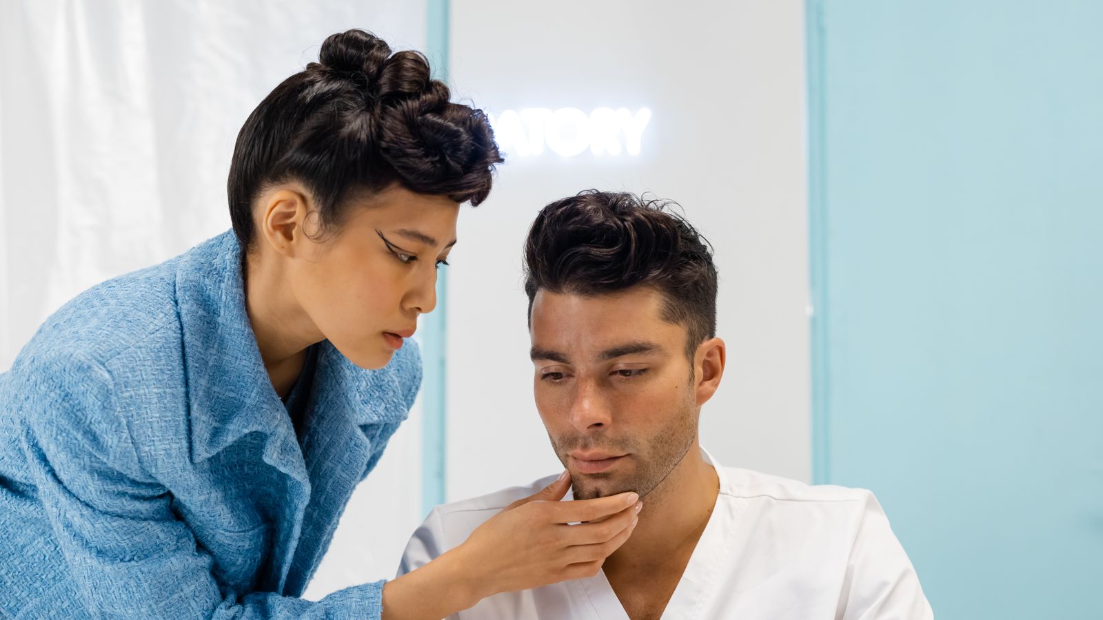 Trichologist in Glasgow examining a patient during a hair and scalp assessment