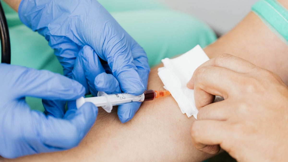 A blood sample being taken by a healthcare professional, the step to complete before booking a trichologist Hounslow