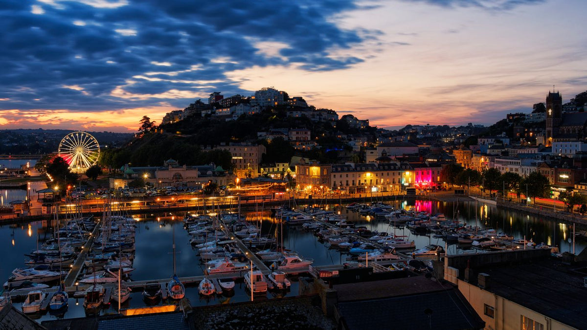 Torquay harbour at sunset, the coastal town where people search for a trichologist Torquay