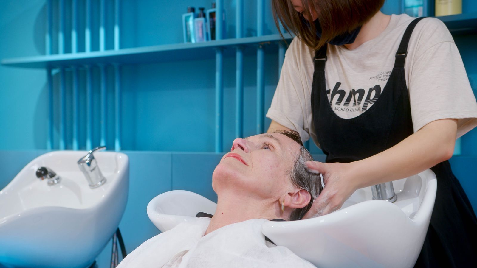 Trichologist in Chesterfield giving a client a professional scalp treatment