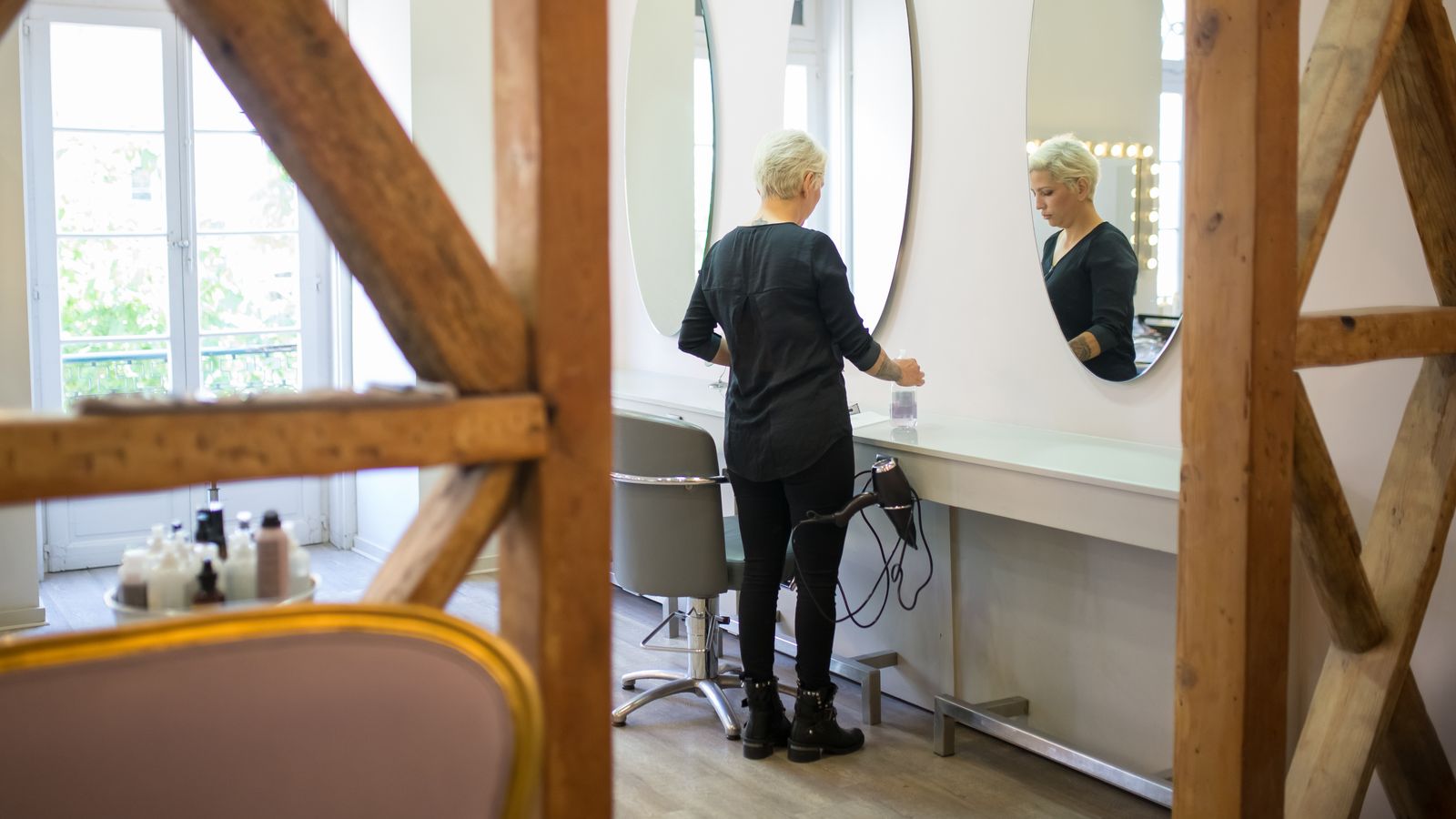 Hair and scalp specialist preparing a consultation station, trichologists Craigavon