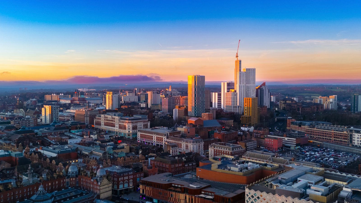 Leeds city skyline at sunset, where people search for trichologists Leeds wide