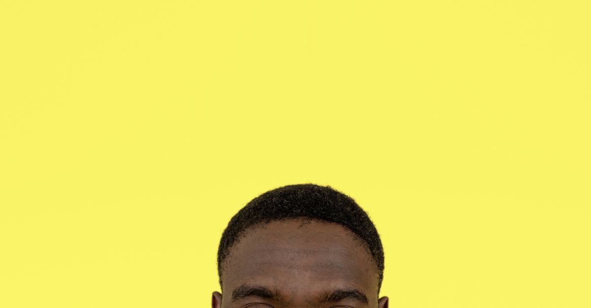 Portrait of a man with a short cut, the view that shows widows peak hair