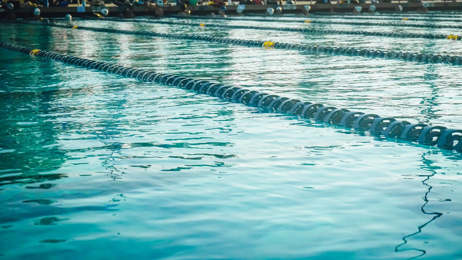Outdoor swimming pool lanes, the chlorine exposure a trichologist Torquay asks regular swimmers about